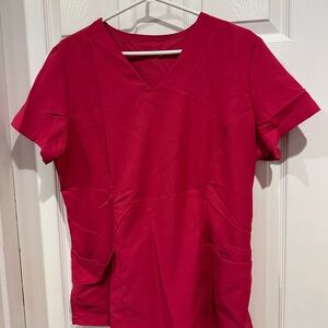Lot of women’s scrub tops. Size large.
